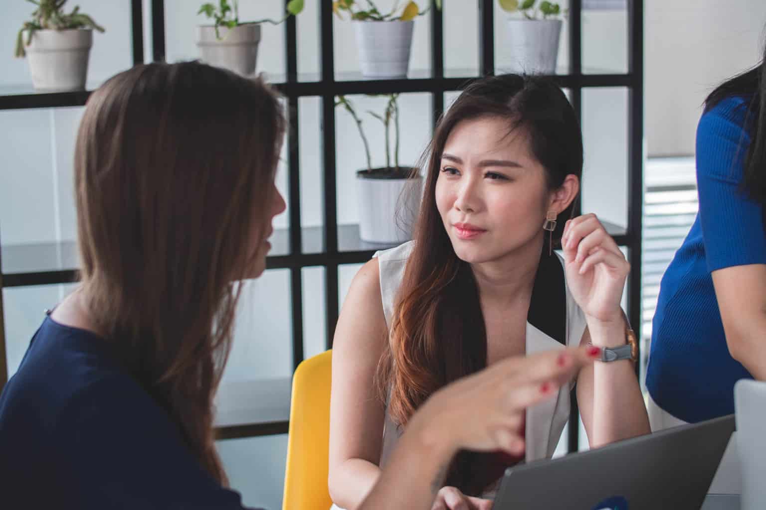 People talking at a table.